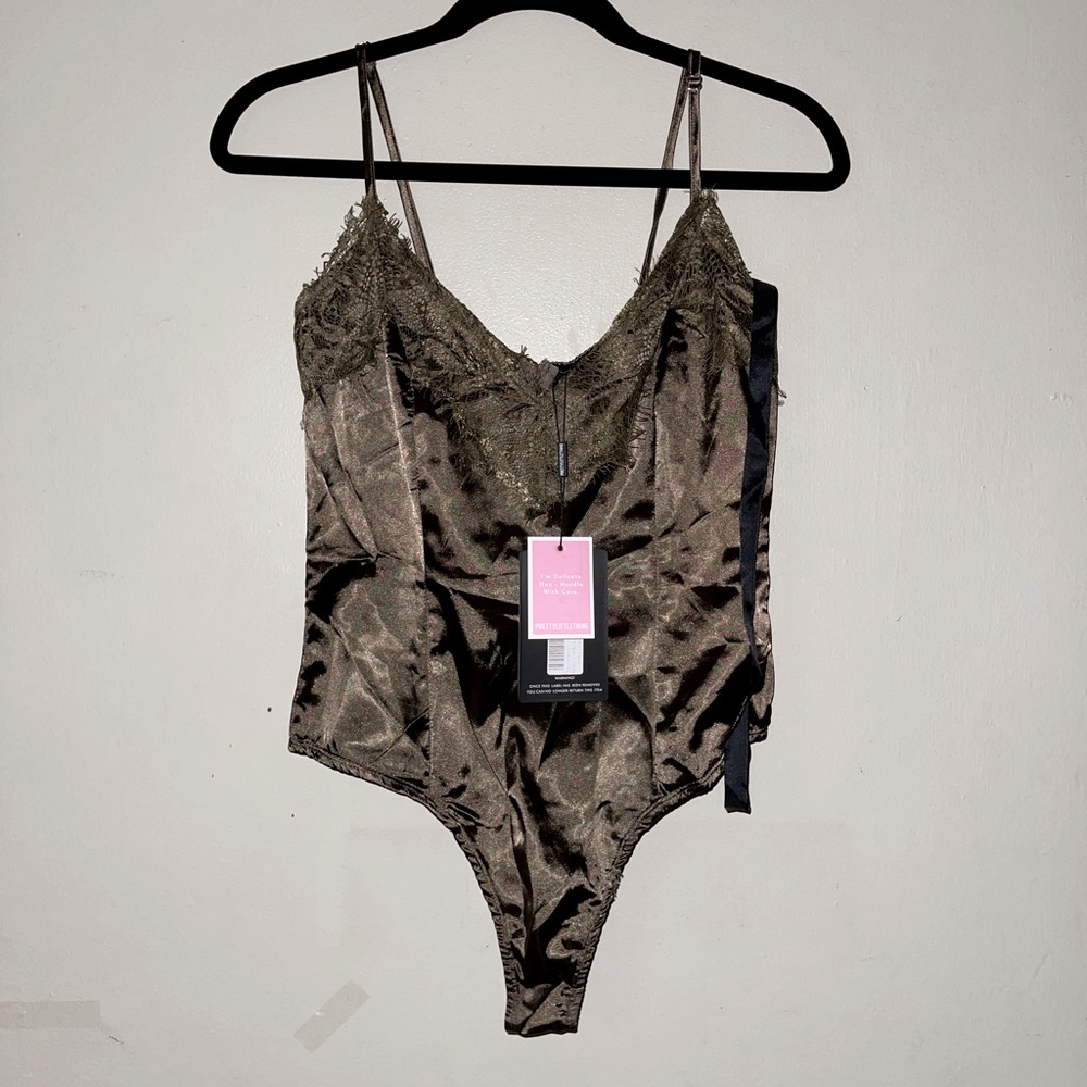 PrettyLittleThing olive satin thong bodysuit with lace trim